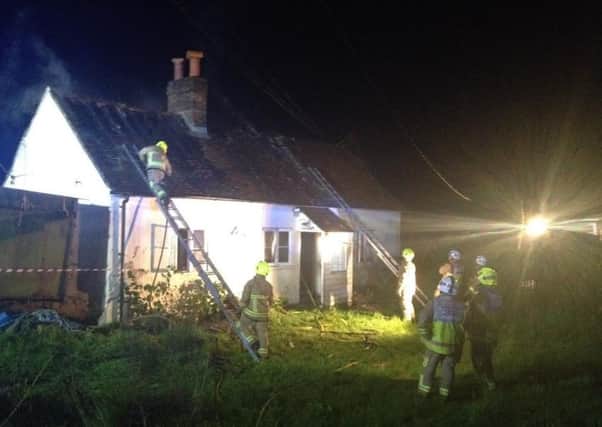 The fire at Burton Mill Farm Cottage, Petworth PICTURE BY EDDIE MITCHELL