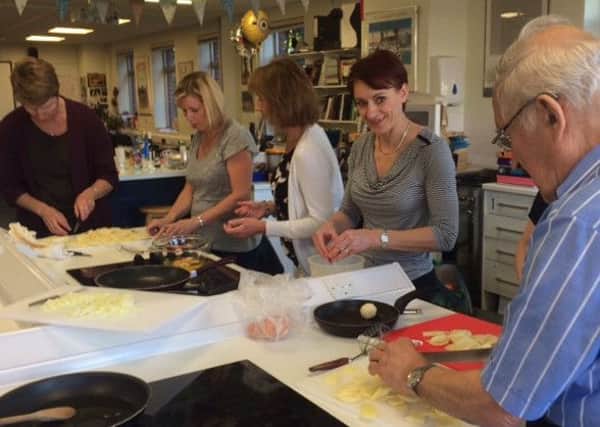 Collyer's adult education students make tortillas SUS-150615-153408001