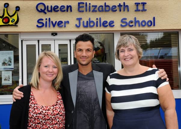 Peter Andre visiting the QEII school to open a new playground in 2012. Photo by Derek Martin ENGSUS00120121009142140