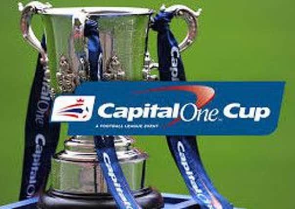 Capital One Cup trophy SUS-150616-093700002