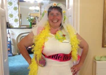 Chef manager Fiona Doughty dressed as the bride to be for her 'Hen do' at Church Farm, prior to her make-believe wedding on Friday for National Care Homes Open Day