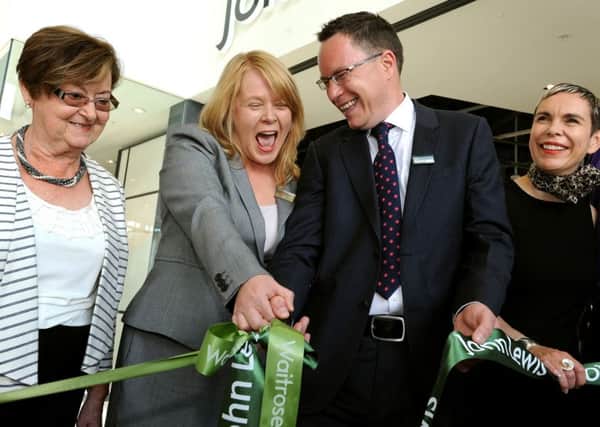 Jo Thomas (Waitrose Store manager) and Nigel Davis (John Lewis Store Manager) open the new stores in Horsham. SR1514019. Pic Steve Robards SUS-150618-095549001