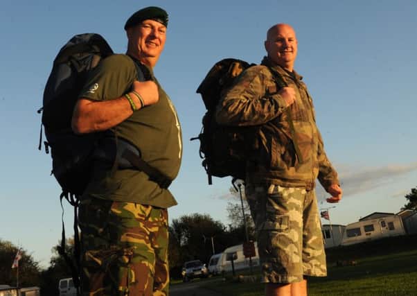 Royal Marines Graham Evans and Gary Fazackerley taking part in a previous Yomp from Brighton the Chichester