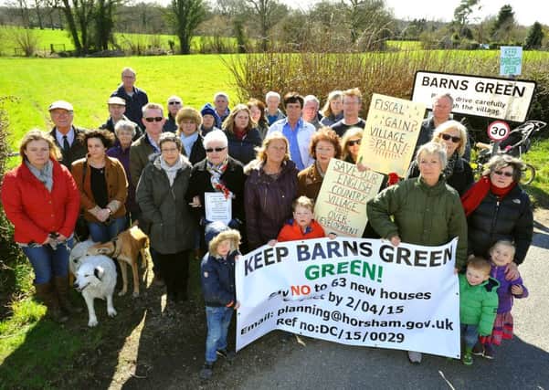 Residents at an earlier protest in Barns Green. Pic Steve Robards SUS-150331-131653001