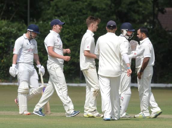 Bexhill celebrate a wicket during their defeat away to Roffey last weekend. Picture by Jon Rigby (SUS-150615-154923008)
