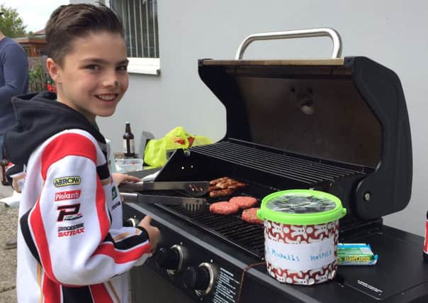 Karson Bloomfield cooking up a storm for charity SUS-150625-103110001