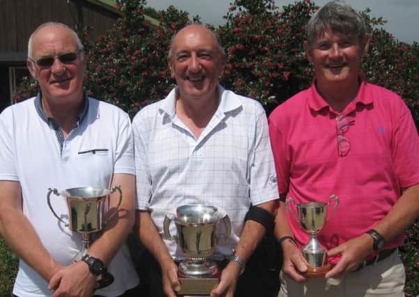 Chi vets' champion John Styles flanked by handicap champion Paul Compton and Seniors Cup winner Mike Snuggs