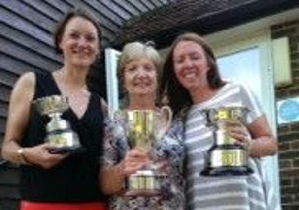 the three winners of (in order) the Championship Handicap Cup (Katie McNeil), the Gibbs Challenge Trophy (Hester Gemmell) and the Championship Rosebowl (Jo Kernohan).