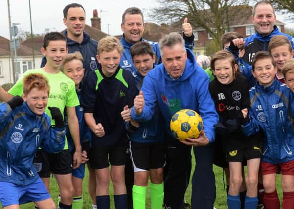 MP Tim Loughton, pictured at Shoreham FC, defended the rights of young people