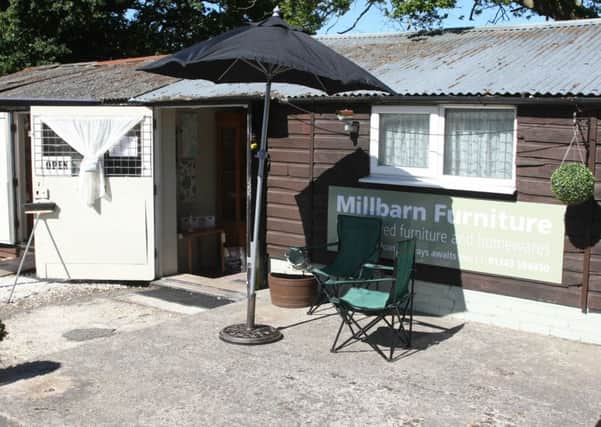 DM1511185a.jpg Millbarn Furniture, Barnham, site of a robbery. Photo by Derek Martin SUS-150630-113116008