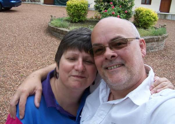 Ross Denby, pictured with his wife Carol, will be abseiling the Spinnaker Tower in support of Butterflies Breast Care Support Group SUS-150624-135950001