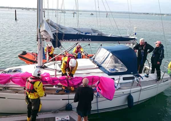 The yacht Mojito is rescued by the RNLI during the Round The Island race