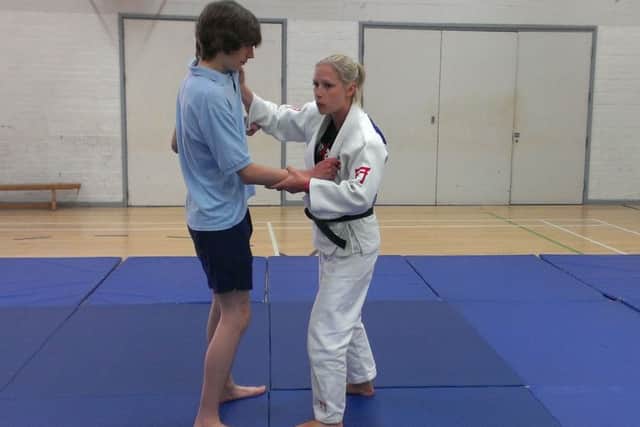 Bradley Chatfield from year ten with fromer British judoka Sophie Johnstone