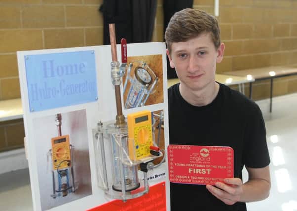 Charlie Brown with his Design and Technology Young Craftsman of the Year award DM1509819a