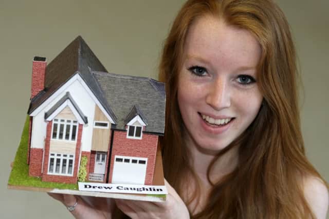Drew Caughlin found the roof of her house particularly difficult, but she had wanted to challenge herself DM1509770a