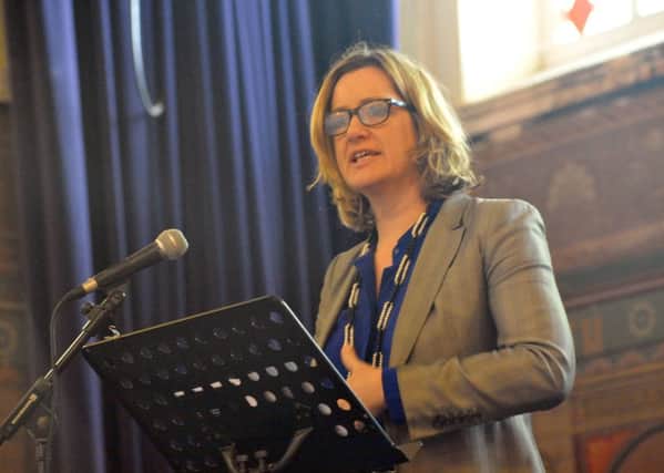 25/1/14- Holocaust Memorial Day Service, St Mary-In-The-Castle, Hastings.  Amber Rudd MP reading 'First They Came' by Martin Niemoller ENGSUS00120140125175840