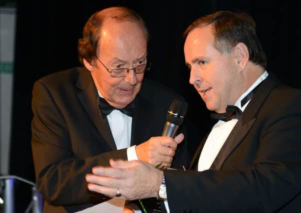 WH 141114 Adur and Worthing Business Awards, 2014. Large Business of the Year ETI Ltd, Peter Webb, MD with host Fred Dinenage. Photo by Derek Martin SUS-141115-205134001