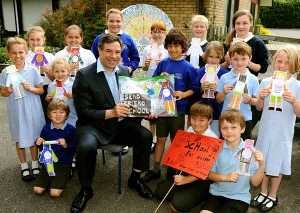 Children from Holbrook Primary will be sending 400 messages to David Cameron all with the title 'If I were a world leader I would.....', MP Jeremy Quin collected the messages to pass on to the PM . Pic Steve Robards SR1514565 SUS-150626-124007001