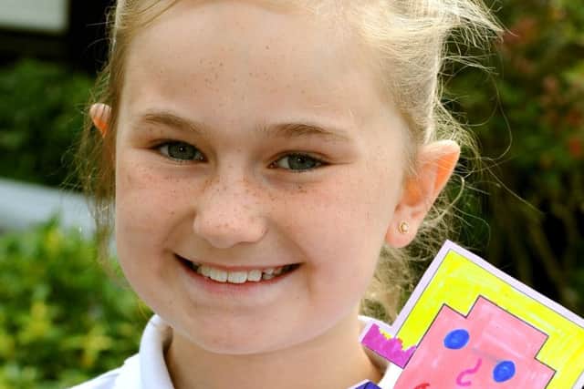 Georgie Milborrow from Holbrook Primary will be sending 400 messages to David Cameron all with the title 'If I were a world leader I would.....' . Pic Steve Robards SR1514570 SUS-150626-124019001