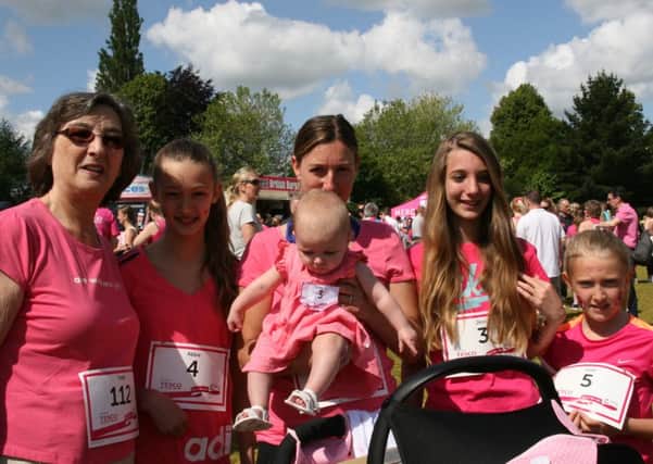 Family of three generations take part in the Race for Life for Cancer Research UK: (L-R) Trish Law, Abbie Simpson, Theresa Simpson with baby Lily,  Jess Simpson and Leah Simpson - picture contributed