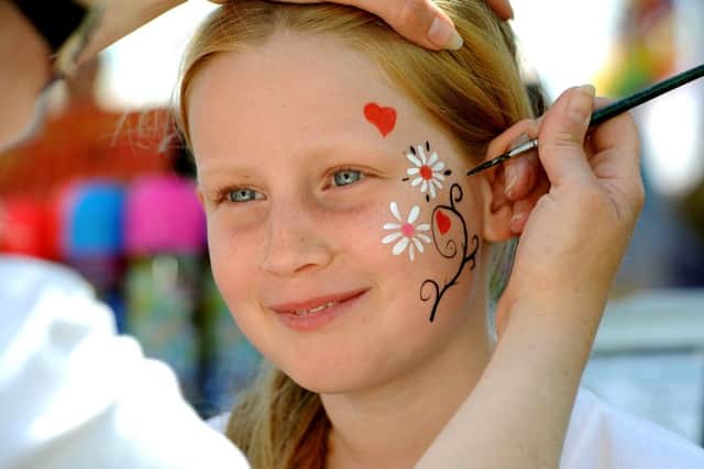 Downlands Community School fair. Kya Tucknott has her face painted. Pic Steve Robards SR1514626 SUS-150629-104053001