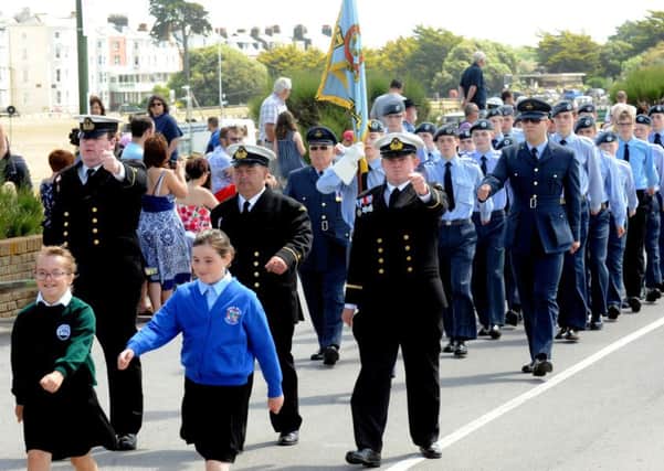 Marching with pride  children from the towns uniformed services and schools in the processionks1500241-13