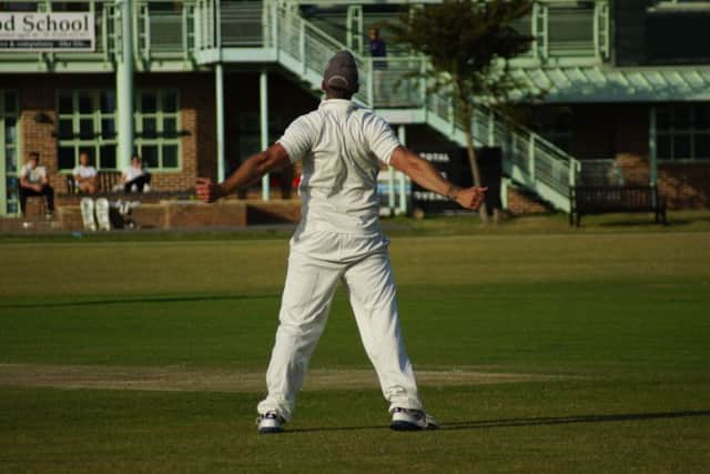 Joe Lamb holds the match-winning catch for Hastings Priory against Findon. Picture courtesy Regwood Photography