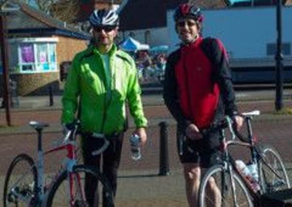 Mike Rolfe, left, and Martin Smith cycled from London to Paris