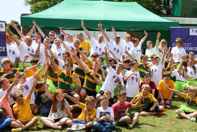 Celebrating the annual Rugby Force Funday to raise money for a new club-house