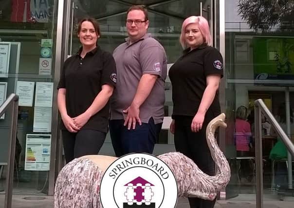 Pictured outside The Capitol with their elephant are staff from The  Springboard Project Vickie Toms, Service Delivery Manager, Luke 
Woodjetts and Catherine Austin. SUS-150107-103152001