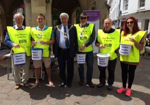 Chichester mayor Peter Budge joins Chichester Bell Tower Youth Drop-in and Chichester Boys Club volunteers for the street collection