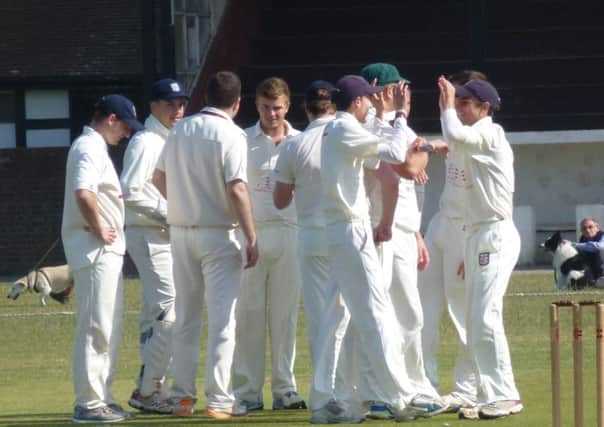 Bexhill Cricket Club's second team celebrates a wicket during its victory at home to East Grinstead last weekend. Picture by Simon Newstead (SUS-150627-211536002)