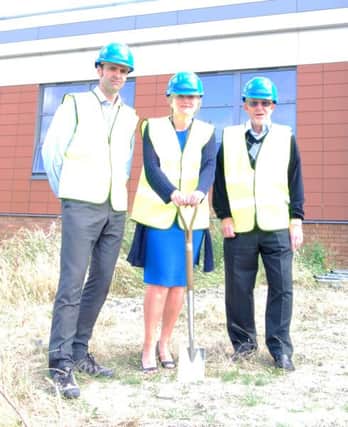 Rory McIntyre, Capital Project Manager, Dr Fiona McKinna, Consultant Oncologist and David Bold, Patient Representative, Sussex Cancer Network Patient Partnership Group on the site of the new Radiotherapy Centre