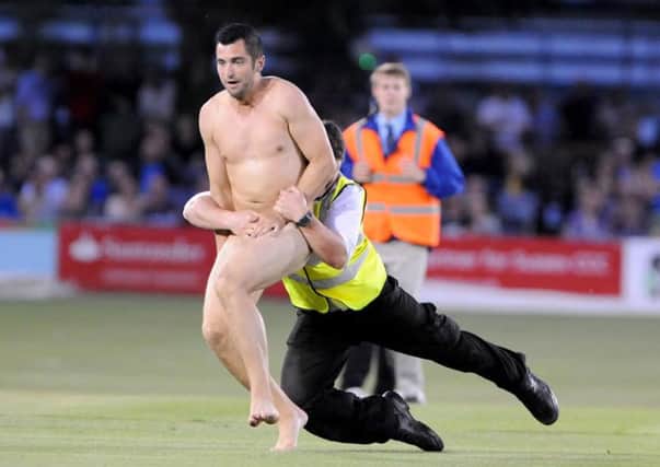 PHOTO BY LIZ FINLAYSON
LF030715D1
Sussex Sharks v Kent Spitfires T20 Blast Game at the County Ground Hove - A streaker invades the pitch SUS-150807-101512001