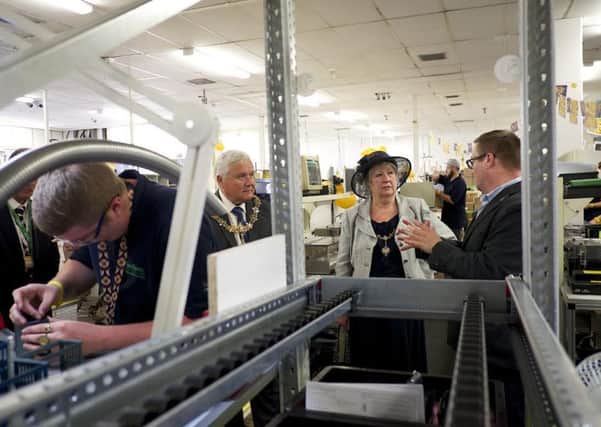 Mayor and mayoress Michael Donin and Linda Williams are shown around the Eurotherm headquarters as part of 50th anniversary celebrations SUS-150907-090812001