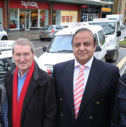 Amin Mirza, chairman of the Crawley Hackney Carriages Association, (right) with Brian Quinn, Labour Crawley borough councillor earlier this year. Mr Mirza spoke at last week's Cabinet meeting