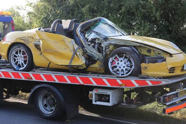 Damaged Porsche after crash with a tractor at Flansham. Picture by Eddie Mitchell