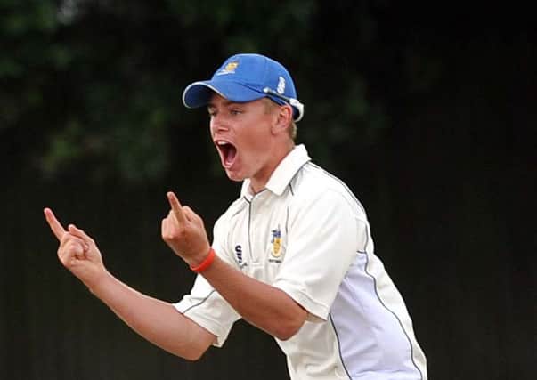 Mason Crane celebrates a wicket while playing for Worthing last season