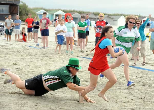 Action from the beach rugby tournament at West Wittering / Pictures by Louise Adams