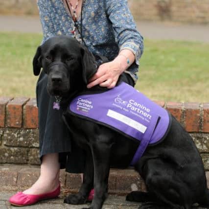 Trish O'Brien with Bowsie the dog. Picture contributed by Chichester District Council