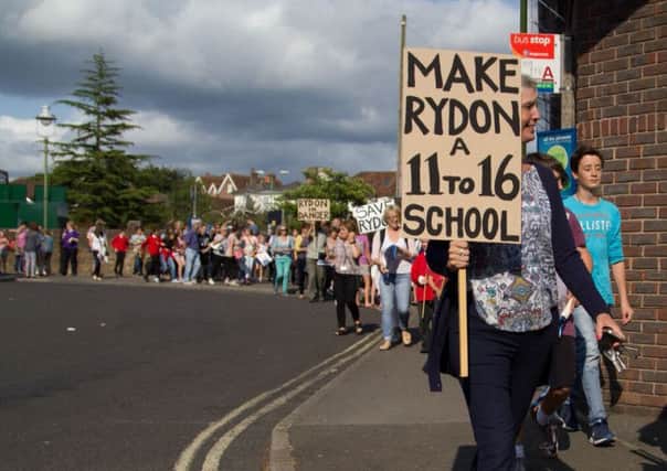 Rydon Community College march to Sullington Parish Hall before drop-in SUS-150907-162028001
