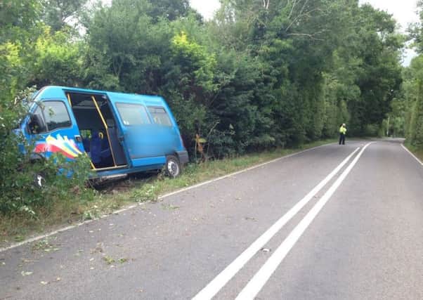 Minibus in hedge on A29 in Clemsfold. Photo by Sussex West Road Policing Unit.