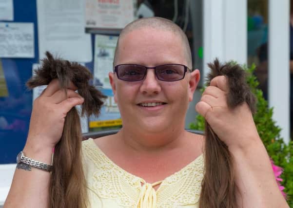 Maria Moudling had her hair shave off to raise money fo St Catherine's Hospice - picture submitted