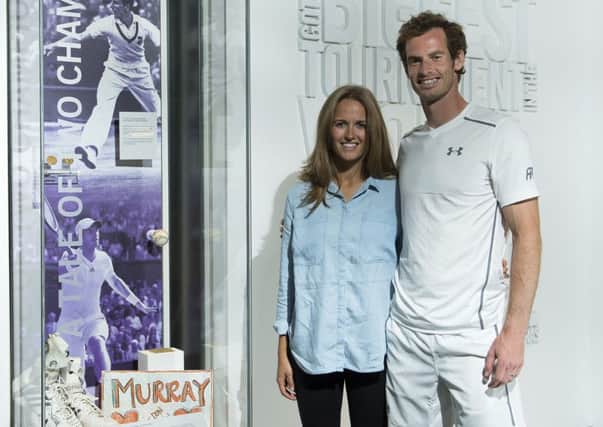 Andy Murray & Kim Murray pictured in the Wimbledon Lawn Tennis Museum. Andy Murray is Raffling of a tennis ball signed by Fred Perry & Andy Murray all proceeds go to St Peter & St James Hospice in Sussex. The Championships 2015 at The All England Lawn Tennis Club, Wimbledon. Tuesday 23/06/2015 Day -6 Photo: AELTC/Thomas Lovelock