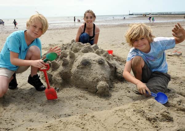 L31821H14

Sandcastle competition Littlehampton Beach Monday George Roberts Macie Sim and Nathan Roberts SUS-140408-161212001