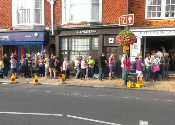 Keane fans queue outside Battle Memorial Hall.