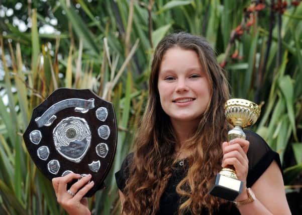 Jess Breach with her awards / Picture by Kate Shemilt