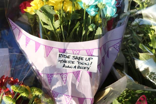 Floral tributes left in memory of Don Lock in Findon.