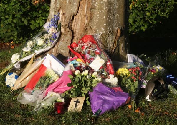 Floral tributes left in memory of Don Lock in Findon.