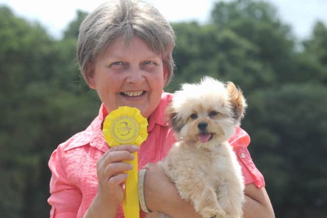 Tracey Turner and prize winning Molly the Pooschi pup LA150054-2